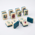 Dark Green Lotus American Mahjong acrylic tiles angled studio shot showing layered edges