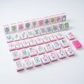 Rose Elephant American Mahjong acrylic tiles angled studio shot